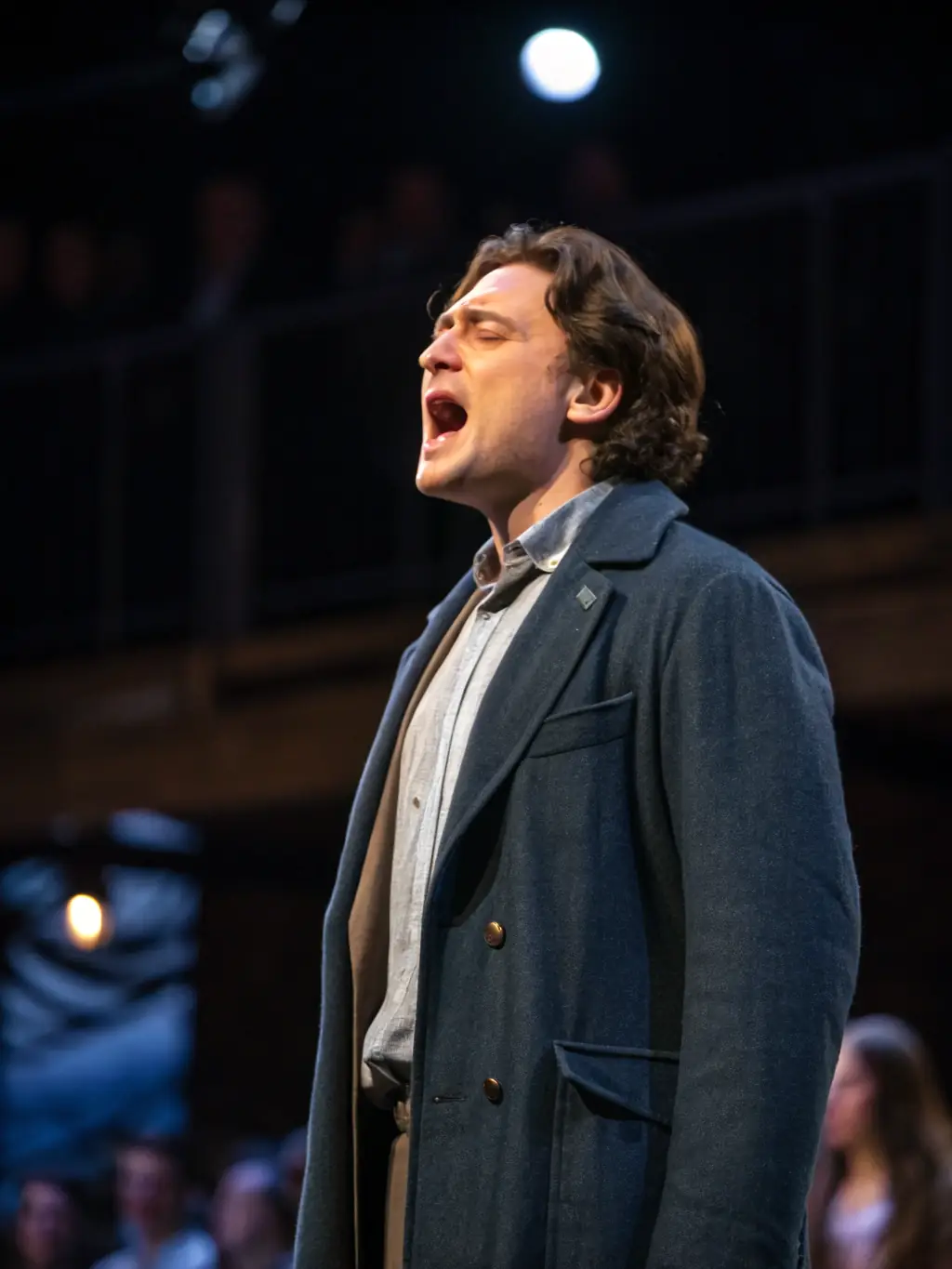 A dynamic image of a solo theatrical performance, featuring an actor in costume delivering a powerful monologue, emphasizing the dramatic storytelling aspect of the festival.
