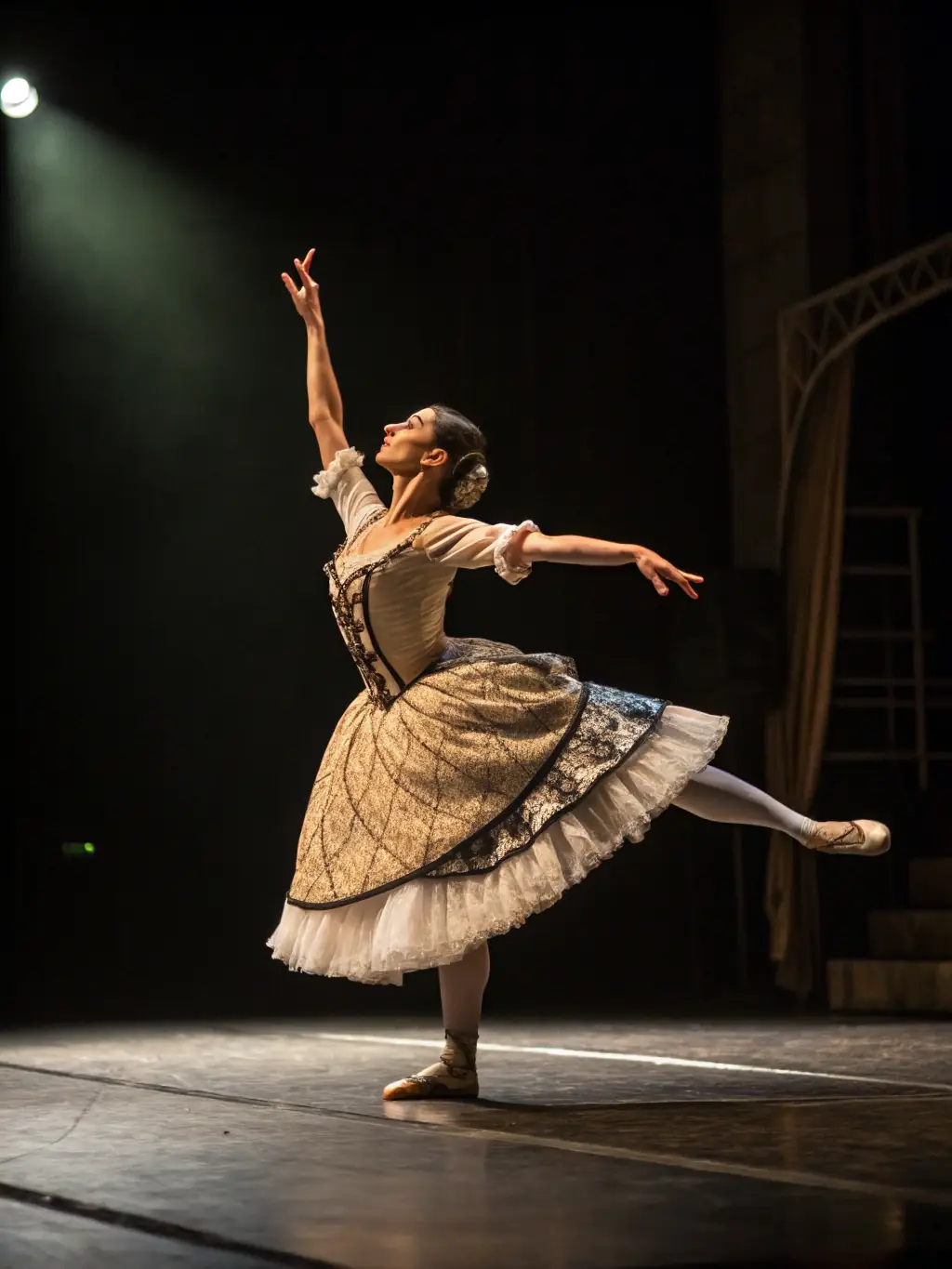 A captivating shot of a solo dancer gracefully moving across the stage, showcasing the beauty and athleticism of dance as a form of solo expression at the festival.
