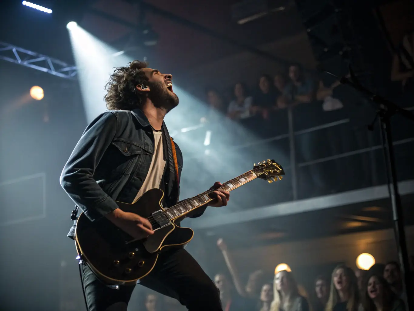 A vibrant photograph capturing a solo musician passionately performing on stage during the TOUT SEUL DEVANT TOUT LE MONDE festival, showcasing the energy and emotion of the event.